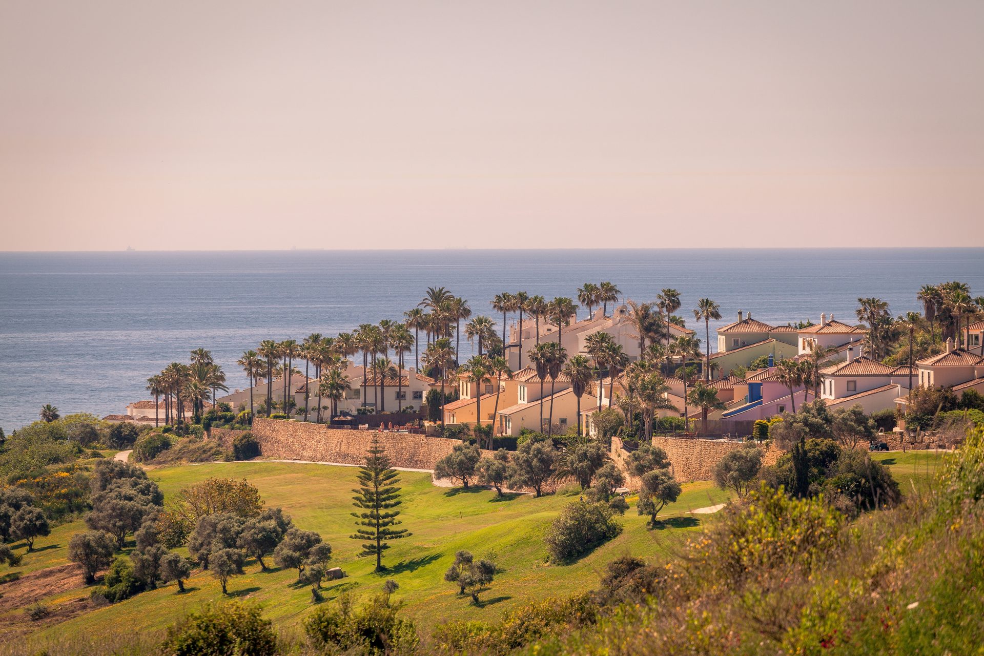 Cozy villa with ocean view, private pool, and lush garden.
